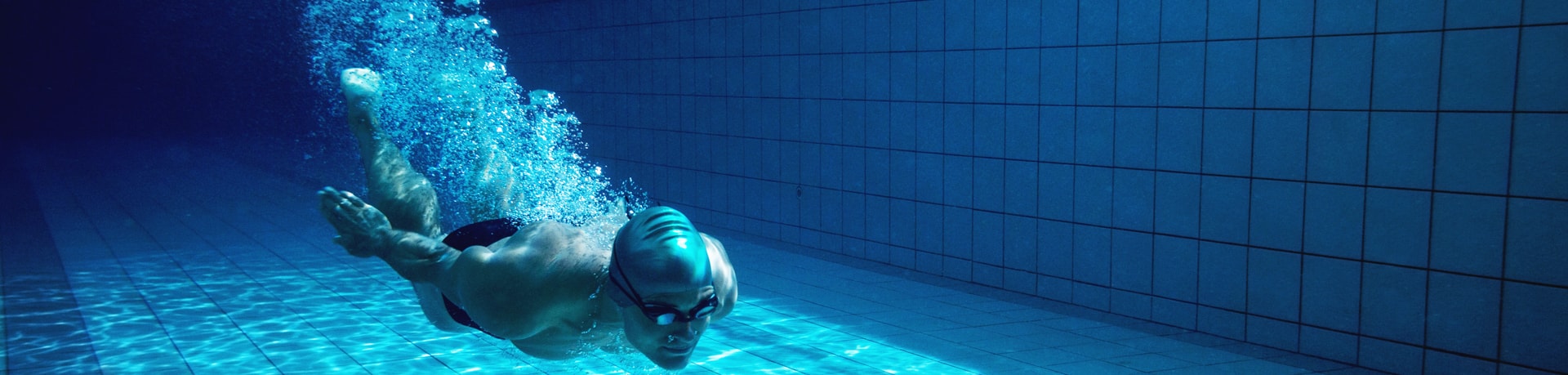 male swimmer in a natatorium